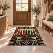 Mudcloth Kwanzaa Rug in an entryway with a wooden door and bench