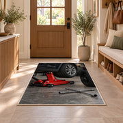 Car jack and spare tire rug in an entryway with a wooden door and bench
