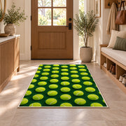 Tennis Ball Pattern Rug in an entryway with a wooden door and bench