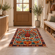 Folk Art Turkey Rug in an entryway with a wooden door and bench