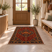 Persian Style Pumpkin Rug in an entryway with a wooden door and bench