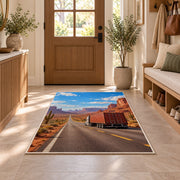 Semi truck on desert highway rug in an entryway with a wooden door and bench