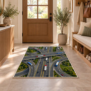 Highway interchange from above rug in an entryway with a wooden door and bench