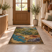 Fantasy coastal world map rug with harbor, desert, mountain ranges, and compass in a sunny entryway