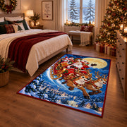 Santa sleigh and reindeer flying over moonlit snowy village area rug, holiday room view 6