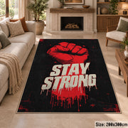 Stay Strong Graphic area rug displayed in a sitting room