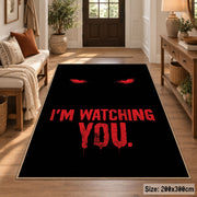 Watching Eyes Typography area rug displayed in a entryway