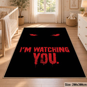 Watching Eyes Typography area rug displayed in a nursery