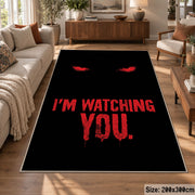 Watching Eyes Typography area rug displayed in a lounge