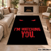 Watching Eyes Typography area rug displayed in a sitting room