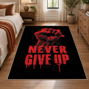 Never Give Up Graphic area rug displayed in a bedroom