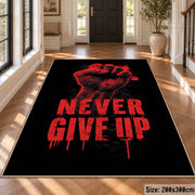 Never Give Up Graphic area rug displayed in a foyer