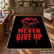 Never Give Up Graphic area rug displayed in a home office