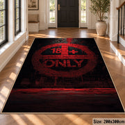 Dark Typographic Circle area rug displayed in a foyer