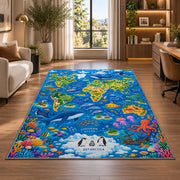 Blue world map rug with ocean animals and colorful coral in a lounge with wooden shelves