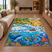 ocean and land wildlife learning map rug displayed in a living room with a fireplace