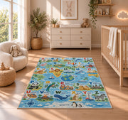 animal world map alphabet rug displayed in a nursery beside a crib