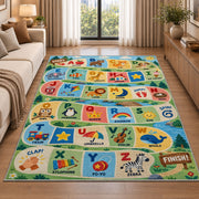 alphabet adventure path rug displayed in a sunlit lounge beside a sofa