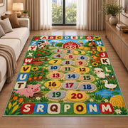 farm alphabet number trail rug displayed in a sunlit lounge beside a sofa