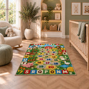farm alphabet number trail rug displayed in a nursery beside an upholstered chair