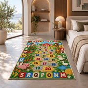 farm alphabet number trail rug displayed in a bedroom in sunlight