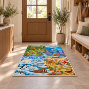 forest ocean and desert animal explorer rug displayed in a entryway beside a wooden door