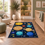 smiling planet solar system rug displayed in a nursery beside an upholstered chair