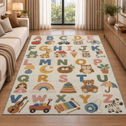 pastel alphabet objects rug displayed in a sunlit lounge beside a sofa