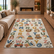 pastel alphabet objects rug displayed in a living room with a fireplace