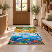 layered wildlife habitat learning chart rug displayed in a entryway beside a wooden door
