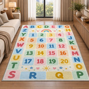 pastel alphabet number grid rug displayed in a sunlit lounge beside a sofa
