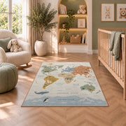 pastel animal world map rug displayed in a nursery beside an upholstered chair