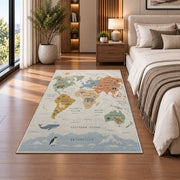 pastel animal world map rug displayed in a bedroom beside the bed
