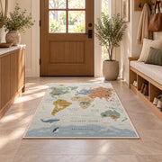 pastel animal world map rug displayed in a entryway beside a wooden door