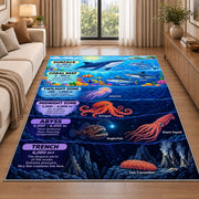 ocean depths marine creatures rug displayed in a sunlit lounge beside a sofa