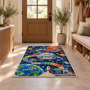 rocket launch space adventure learning rug displayed in a entryway beside a wooden door