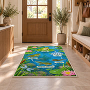 frog life cycle pond learning rug displayed in a entryway beside a wooden door