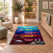 colorful ocean depth zones rug displayed in a nursery beside an upholstered chair