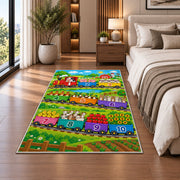 farm train counting adventure rug displayed in a bedroom beside the bed