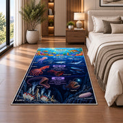 underwater ocean explorer rug displayed in a bedroom beside the bed
