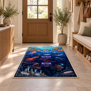 underwater ocean explorer rug displayed in a entryway beside a wooden door
