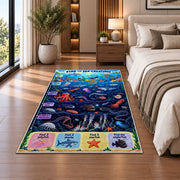 ocean creature search game rug displayed in a bedroom beside the bed