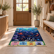 ocean creature search game rug displayed in a entryway beside a wooden door
