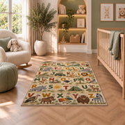 safari animal alphabet rug displayed in a nursery beside an upholstered chair