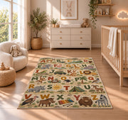 safari animal alphabet rug displayed in a nursery beside a crib