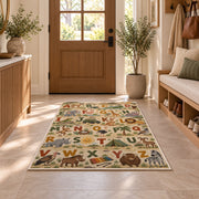 safari animal alphabet rug displayed in a entryway beside a wooden door