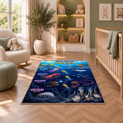 submarine deep sea discovery rug displayed in a nursery beside an upholstered chair