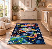 earth to mars rocket journey play map rug displayed in a nursery beside a crib