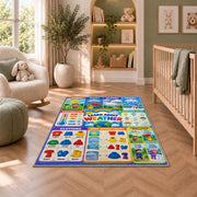weather and clothing learning chart rug displayed in a nursery beside an upholstered chair