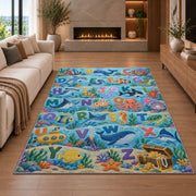 ocean animal alphabet rug displayed in a living room with a fireplace